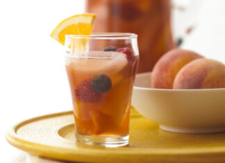 This Peachy Iced Tea Sangria has a fruity twist on iced tea that’s packed with delicious summer berries and peaches.