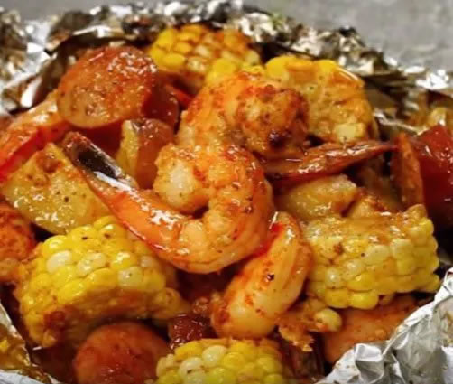 Easy shrimp boil foil packets baked with summer veggies