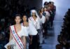 Making a statement: models sporting ‘Who gets to be American?’ sashes for Prabal Gurung’s spring/summer 20 collection. Photograph: Craig Ruttle/AP